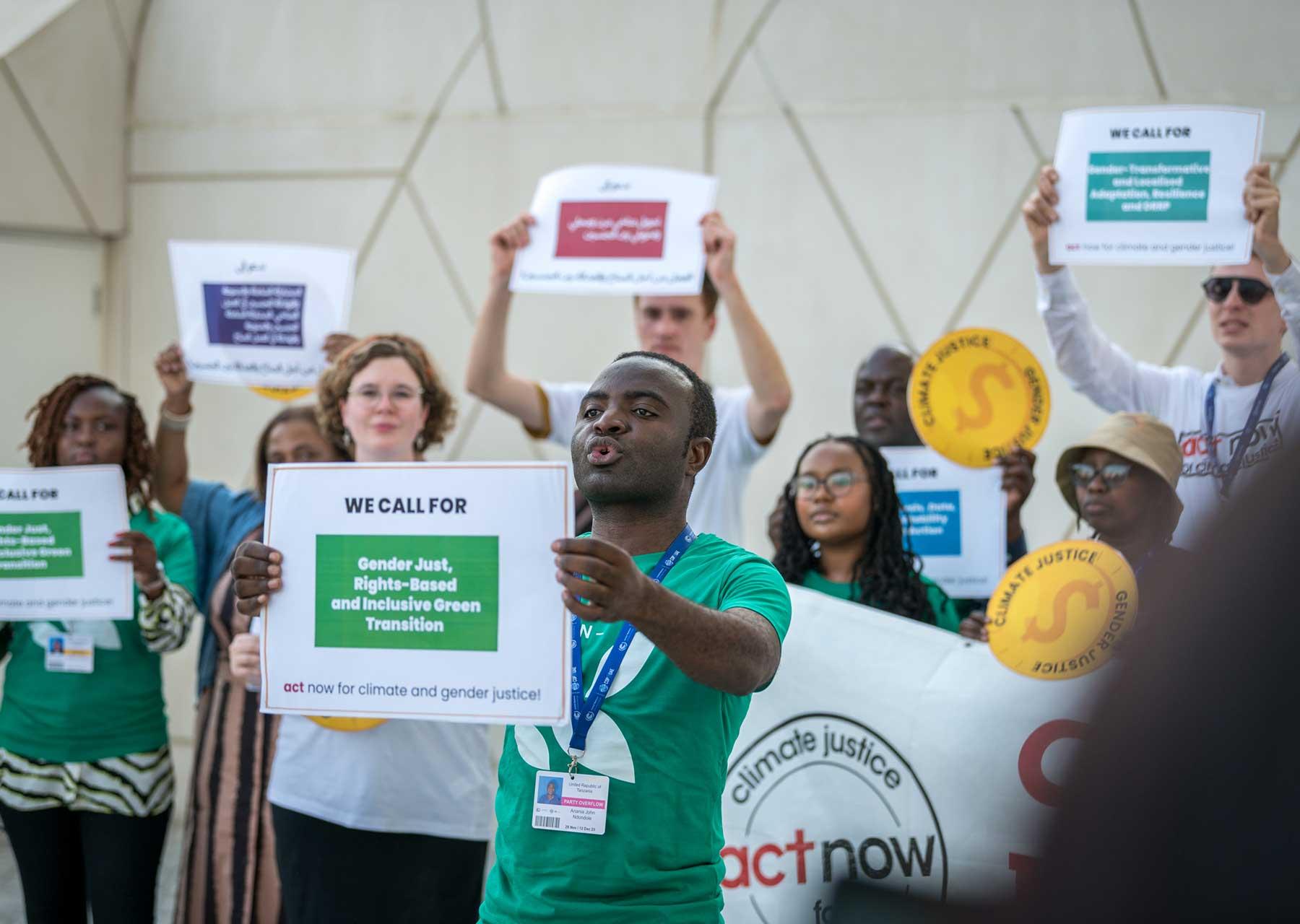 Anania John Ndondole of the Evangelical Lutheran Church in Tanzania participates in an advocacy action for gender justice together with Christians from various, at the United Nations climate summit COP28. Photo: LWF/A. Hillert