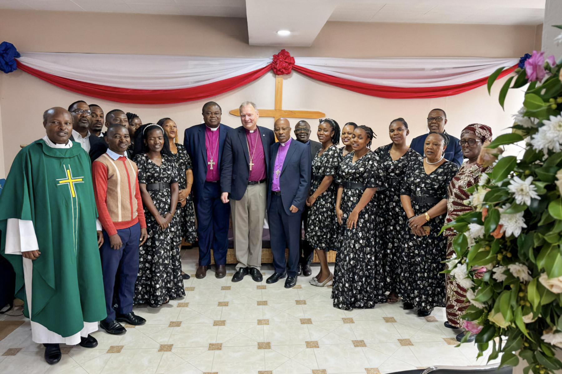 LWF President Henrik Stubkjær and his delegation join ELCT leaders and head office staff for morning worship as their visit begins. Photo: LWF/A. Danielsson