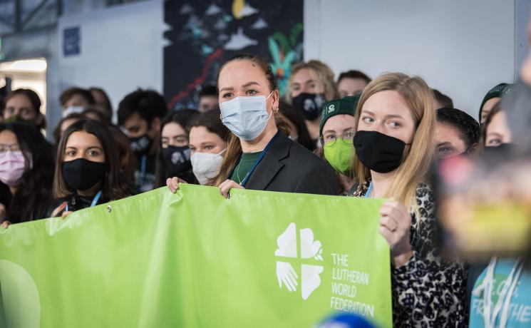 Demonstrators at a ‘Youth and Public Empowerment Day’ during COP26 in Glasgow last November. Photo: LWF/A. Hillert 