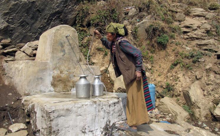 Thanks to collaboration between the LWF and IRW, locals have a fountain that provides safe drinking water. Photo: LWF/IRW