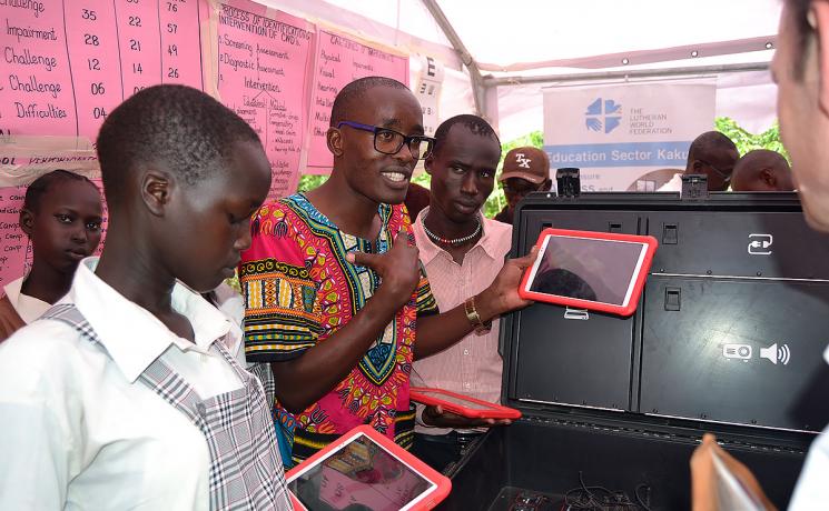 Students from LWF’s Angelina-Jolie school in Kakuma refugee camp with tablets in computer class. Photo: LWF