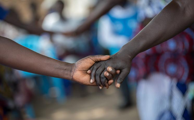 Hands of refugee women from South Sudan at the Palorinya settlement in northern Uganda, supported by the LWF’s World Service program. Photo: LWF/Albin Hillert