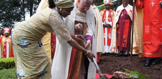 LWF Council member Ms Titi Malik and LWF President Bishop Munib A. Younan plant a commemorative tree for the 60th anniversary of the first Lutheran conference in Marangu. Photo: LWF/Tsion Alemayehu