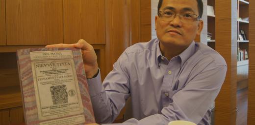 LCM Bishop Aaron Yap shows a 16th century Bible. Photo: LWF/C. KÃ¤stner