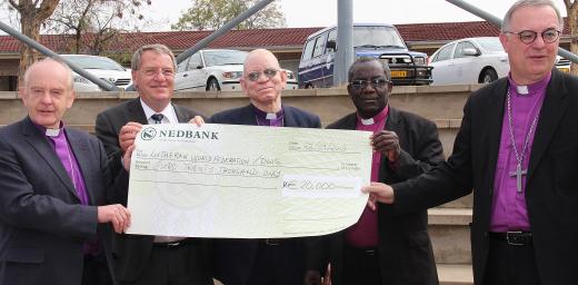 LWF Delegation presenting donation to drought relief. Â© The Namibian