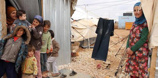 Children in the Zaâatri refugee camp play outside their newly installed winterized shelter. Â© A. G. Riisnes/NCA