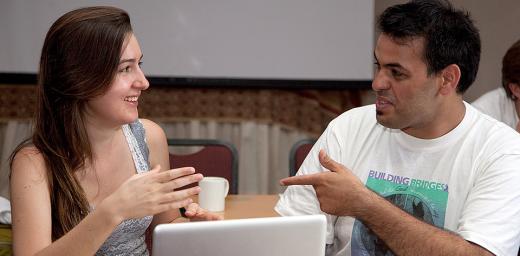 (left to right) Raquel Kleber and Marcelo Leites discuss possible joint initiatives during the Youth for Eco-Justice Meeting co-organized by the LWF in 2011 in South Africa. Â© WCC/LWF/W. Noack