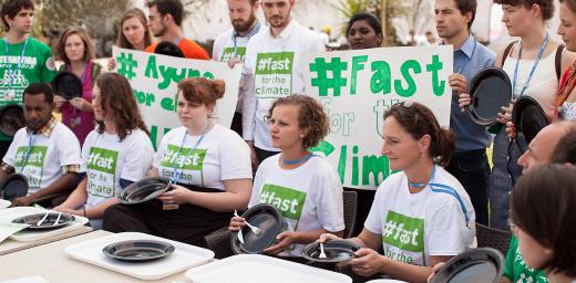 Fasting action at COP20. Photo: LWF/Sean Hawkey