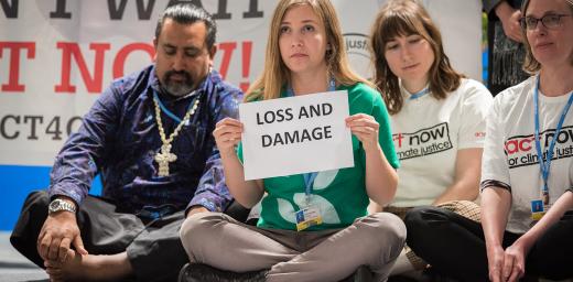 Erika Rodning from the Evangelical Lutheran Church in Canada illustrates the lack of balance in finance of the global climate response during a stunt at COP25 in Madrid, Spain. Most of the finance is put into mitigation, some into adaptation, but very little into loss and damage, even though âthat's where the people are