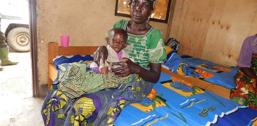 A mother and her child in one of the LWF health centers. The child is being treated for severe malnourishment. Photo: LWF DRC
