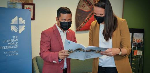 The publication was put together by Ms Marina DÃ¶lker (right) LWF Program Executive for Diakonia and Development and Mr Allan Calma (left), World Service Global Humanitarian Coordinator. Photo: LWF/S. Gallay
