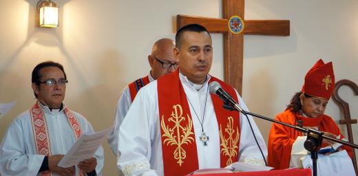 Rev Rolando Antonio Ortez, Pastor President of the ICLH, presides at the ordinations of three male and four female pastors in 2017. Photo: LWF/P. Cuyatti