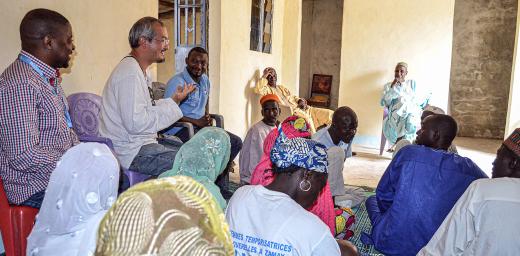Rev. Dr Sivin Kit and World Service Emergency Program Coordinator Clovis Mwambutsa in dialogue with the Muslim Chief of a community in Cameroon hosting refugees from neighbouring countries. Photo: LWF/Moise Amedje