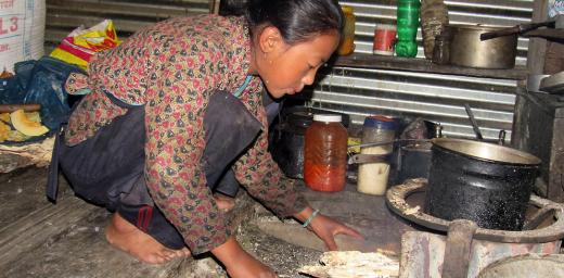 Nima Chhiyog Lama, 13, a seventh grader in Gatlang prepares food and takes care of her siblings before school. Surviving the earthquake is like being given a second life, she says. Photo: LWF Nepal