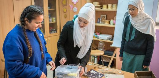 15-year-old Rena Almaharmeh (left), and her friends Danya (centre) and Asma (right) work in the Talent Room of Rufaida Al Aslamieh Primary Mixed School in Amman. All photos: LWF/Albin Hillert