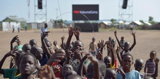 Children hold up an antenna to better receive the TEDx broadcast in Kakuma refugee camp. All photos: TEDx