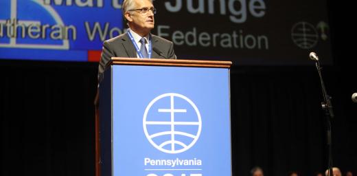 Rev. Dr Martin Junge addresses the Mennonite World Conference, saying the forgiveness of Mennonites brought Lutherans and Mennonites closer together to serve the world. Photo: Jon Carlson for Mennonite World Conference
