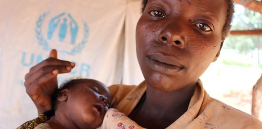 Hatungaimana Justina gave brith to baby Furaha Eliza just days after fleeing her native Burundi. She and her family made it to the safey of the Mtendeli camp where LWF partner, Tanganyika Christian Refugee Service drills boreholes that supply water to the camp. Photo: LWF/S.Cox