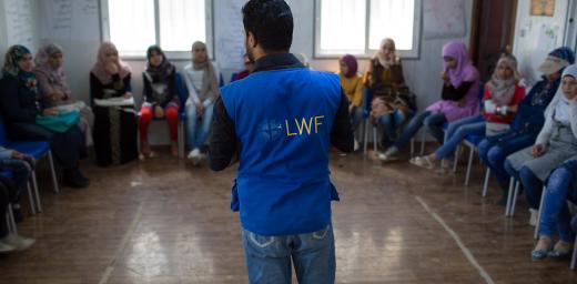 Syrian refugee Ahmad instills the value of education at the Za'atari camp. Photo: LWF Jordan