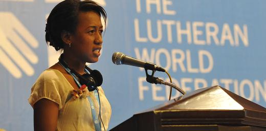 Mami Brunah Aro Sandaniaina of the Malagasy Lutheran Church asks the Council how their churches engage young people who have taken part in LWF youth programs. Photo: LWF/M. Renaux