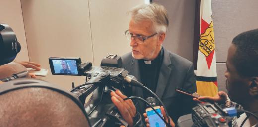 Journalists interview LWF General Secretary Martin Junge following a meeting with government officials in Harare. Photo: LWF/A. Danielsson