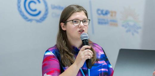 Michelle Schwarz from the Evangelical Lutheran Church in Saxony (Germany) is an LWF delegate to COP27. Here she speaks on an interfaith youth panel during a side event of the UN climate conference. LWF/Albin Hillert