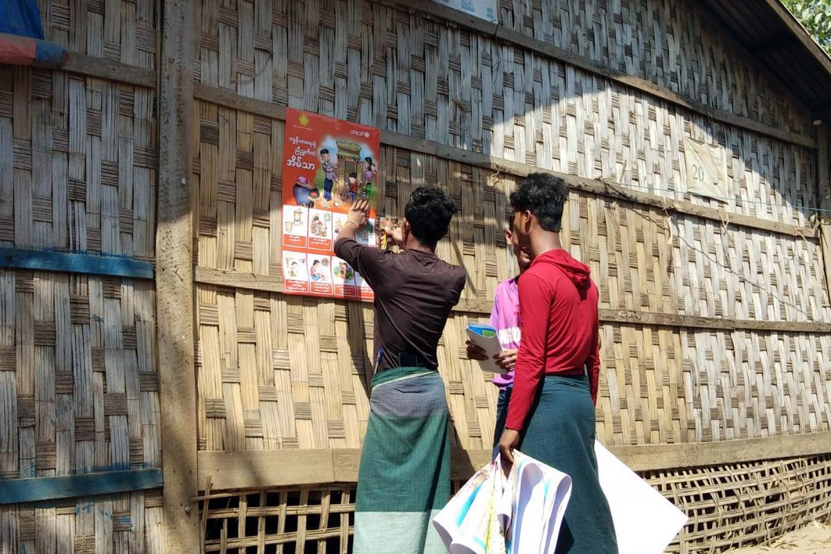LWF is working in Myanmar’s Rakhine, Chin and Kayin States to support awareness raising on COVID-19 prevention. Here, posters are distributed in local languages with information on hygiene and other measures to stop the spread of infection. Photo: LWF Myanmar 