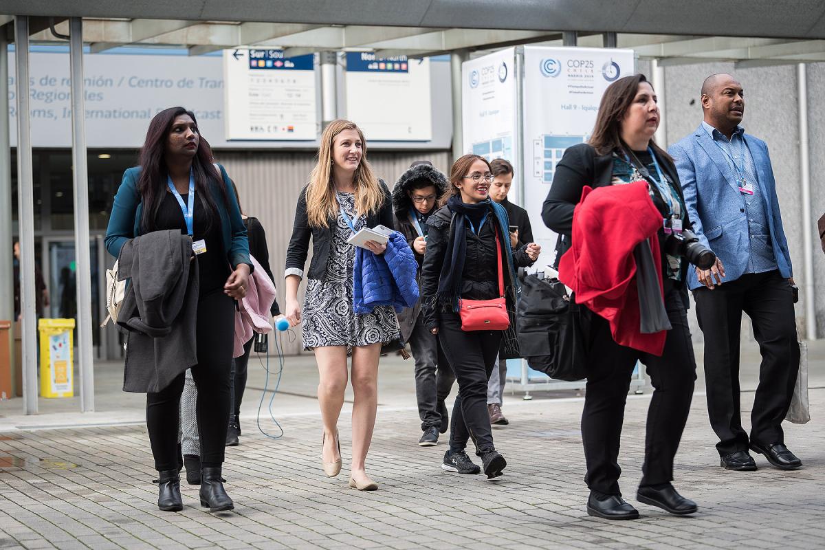 Lutheran World Federation delegates walk towards the plenary hall on day one of COP25 in Madrid. All photos: LWF/Albin Hillert 