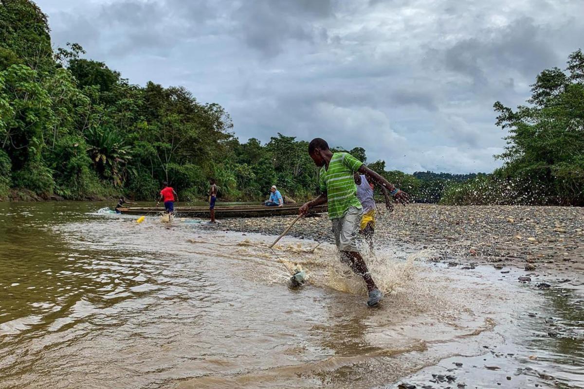 Youth playing at the bank of the Río Pogue, Atrato. Photo: LWF Columbia 