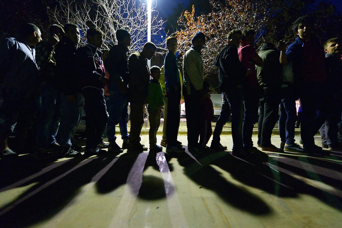 Refugees queue at Chios, Greece. Photo: Paul Jeffrey