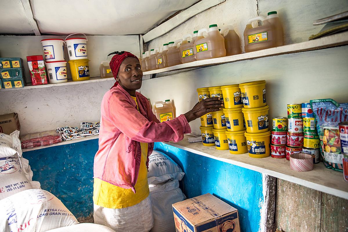 A woman in the community store in Despagne. Photo: LWF Haiti/H. Enge