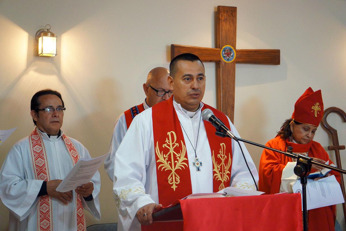 Rev Rolando Antonio Ortez, Pastor President of the ICLH, presides at the ordinations of three male and four female pastors in 2017. Photo: LWF/P. Cuyatti