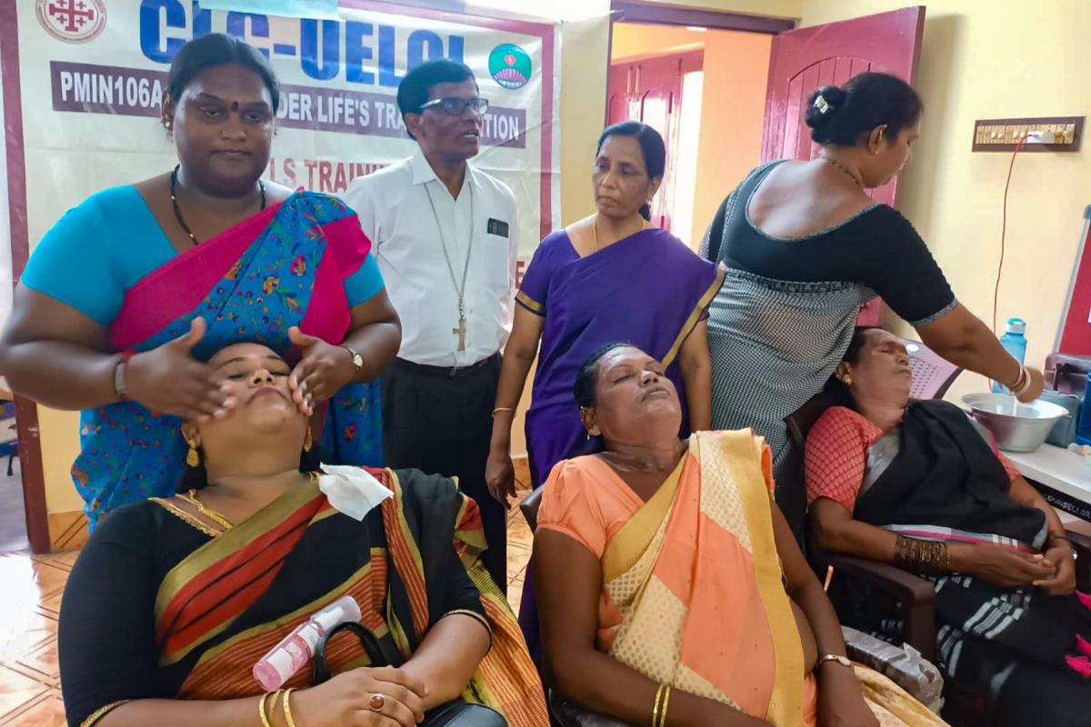 In Chennai, India, the Christ Lutheran Church runs economic empowerment and personal development skills for members of the transgender community. In this photo, Bishop Dr M. Stanley Jose (background, second from left), with some of the students in a beautician course. Photo: CLC 