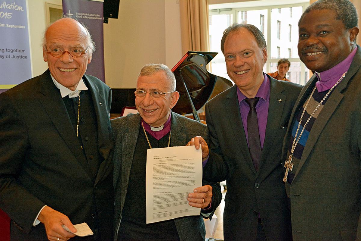 Affirming global solidarity with asylum seekers, migrants and the poor, from left: Bishop Gerhard Ulrich, United Evangelical Lutheran Church of Germany (VELKD); LWF President Bishop Dr Munib A. Younan; Nordkirche’s Synodpräses Dr Andreas Tietze; and Tanzania’s Presiding Bishop Dr Alex G. Malasusa, LWF Vice-President for Africa. Photo: Nordkirche/Eberhard von der Heyde