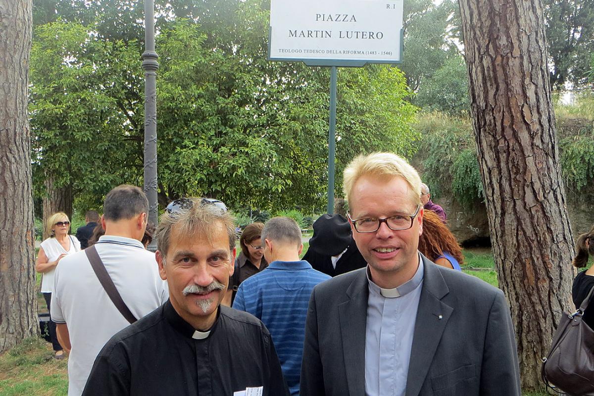 The Piazza Martin Lutero constitutes an ecumenical witness in the daily life of residents and visitors to Rome, says Lutheran pastor Rev. Jens-Martin Kruse (right), who witnessed the inauguration of the public square with hundreds of parish members including Rev. Per Edler (left) of the Swedish-speaking congregation. Photo: Silke Kruse