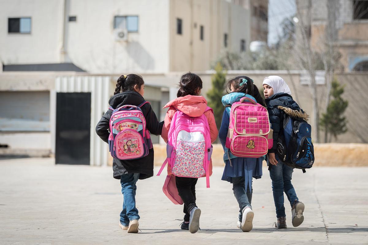 A group of girls head to a school in Jordan’s Sahab district that is supported by LWF for both Jordanian and Syrian children. Photo: LWF/Albin Hillert