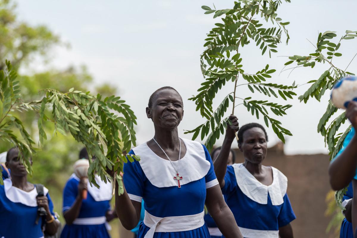 A group of women from the Kajo-Keji Diocese march to church in the refugee settlement of Palorinya in Obongi district, West Nile area of northern Uganda. All photos: LWF/Albin Hillert 