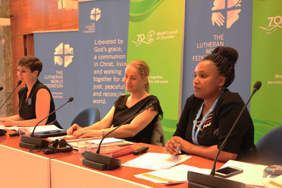 Jillian Aballe (World Council of Churches), Christine Löw (UN Women Geneva liaison office) and Christine Mangale (Lutheran Office for World Community) sit on a panel during the women's human rights advocacy training for faith-based organizations, held in Geneva. Photo: LWF/George Arende